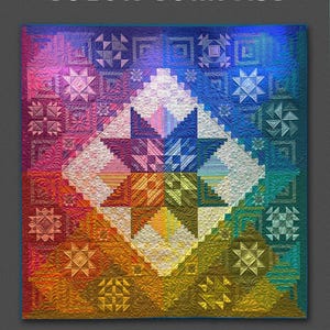 May include: A square quilt titled COLOR COMPASS featuring a vibrant rainbow gradient of colors. The design includes intricate star and geometric patterns with detailed quilting textures. Text indicates a finished quilt size of 84 x 84 inches.