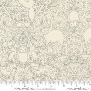 May include: Cream-colored fabric with a repeating pattern of woodland creatures and floral elements in gray. The design includes bears, owls, turtles, and stylized flowers. The fabric has a ruler along the bottom edge.