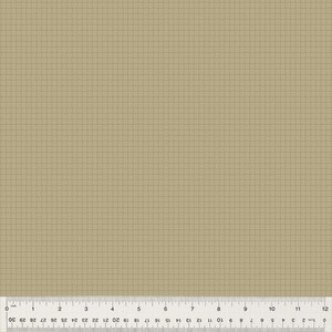 May include: Tan fabric with a grid pattern. The fabric is a solid color with a repeating square design. A ruler with inch and centimeter markings is at the bottom of the image, showing measurements up to 12 inches and 30 centimeters.