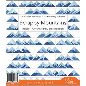 May include: A sheet of "Scrappy Mountains" foundation papers for paper piecing. The design features rows of blue and teal mountain shapes. The text reads "Foundation Papers for 50 Different Paper-Pieced" and "Includes 100 Foundations (2 of Each Design)". The finished block size is 3" x 6".