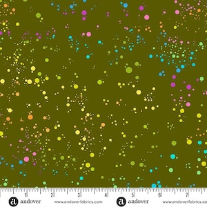 May include: Olive green fabric with a scattered pattern of colorful dots in shades of yellow, green, blue, pink, and orange. The dots vary in size and density, creating a speckled effect. The fabric has a ruler along the bottom with the Andover logo.