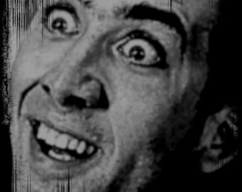 May include: A monochrome halftone image of a man's face, showing wide eyes and a broad grin. The image has a distressed texture with vertical lines, giving it a vintage or comic book aesthetic. The overall effect is one of exaggerated surprise.