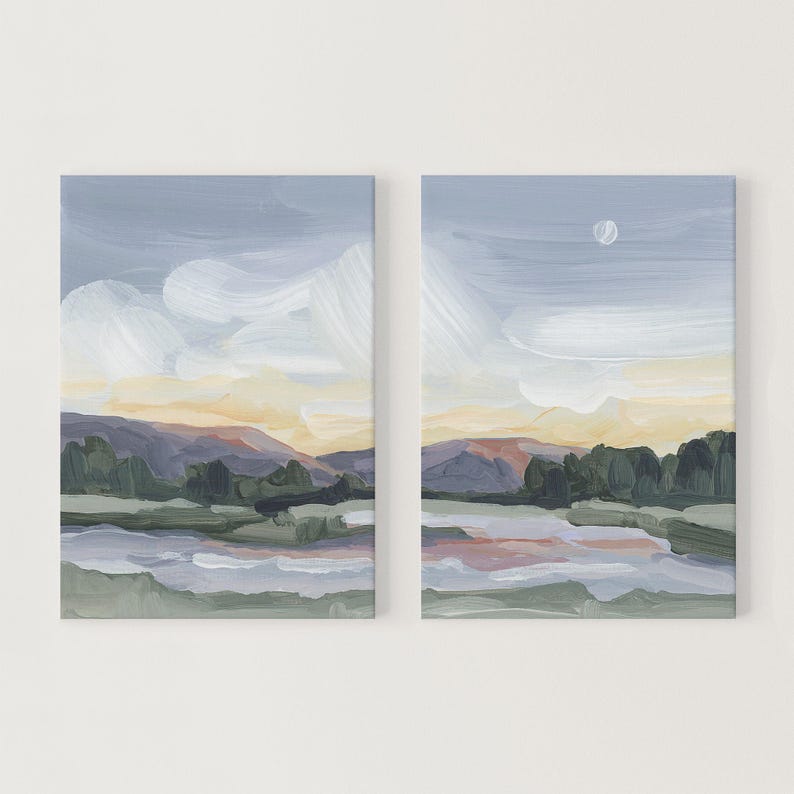 a couple of paintings hanging on a wall