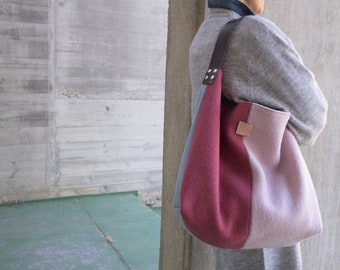 Multicolor shoulder hobo bag with confortable leather strap.