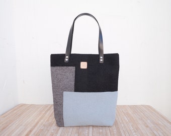 Lightweigth black tote bag for keep documents and personal items.