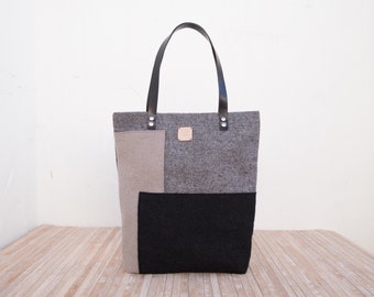 Geometric grey tote bag of minimalist design for work.