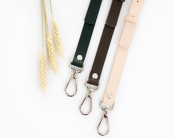 Leather strap for crossbody bag. Adjustable and removable leather strap. Leather handle available in black, brown, and natural colors.