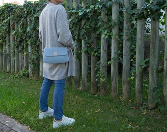 Light blue shoulder bag with leather strap. Wool crossbody bag for women.