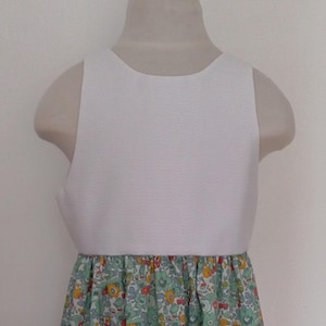 Children&#39;s dress size 6 years in cotton with blue and yellow flowers
