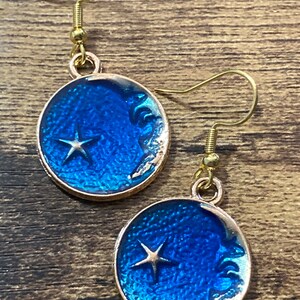 Celestial star & moon blue enamel drop earrings gold tone