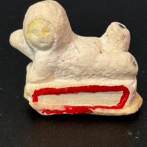 Antique Vintage PLASTER or bisque Snow Baby on sledge Christmas Xmas Cake topper