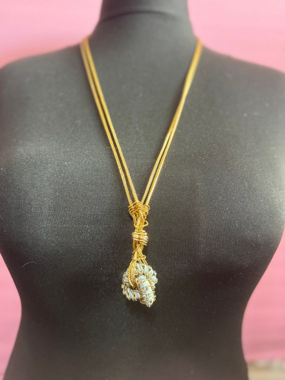Swarovski Crystal Knot Pendant Necklace: Gold Tone Japanese Silk Cord