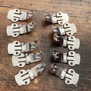 5 pairs of medium 3 x 1.5cm silver tone sew on shoe clips