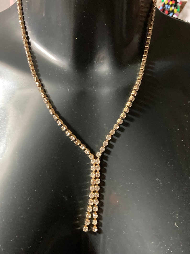 true Vintage pristine 1970s clear diamanté rhinestone gold plated lariat negligee drop necklace old shop stock image 4