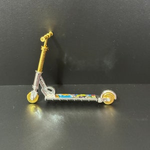 Miniatur-Gold und Silber Roller Kuchen Topper Dekoration Kunststoff Finger geöffnet Sport