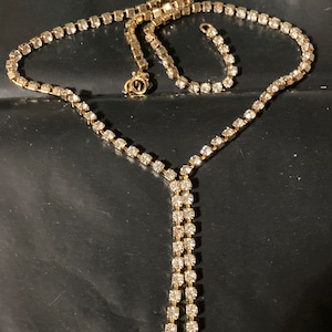 true Vintage pristine 1970s clear diamanté rhinestone gold plated lariat negligee drop necklace old shop stock image 1