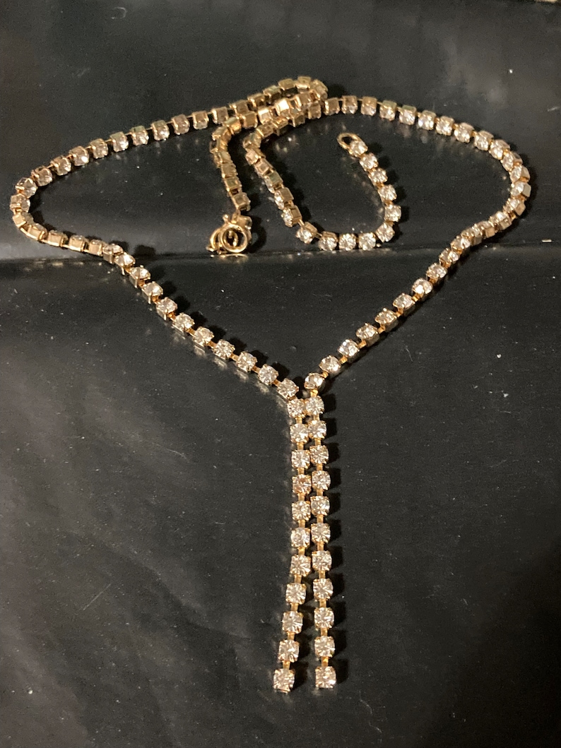 true Vintage pristine 1970s clear diamanté rhinestone gold plated lariat negligee drop necklace old shop stock image 1