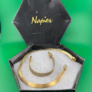 Boxed designer Napier signed matching gold flat mesh necklace and bracelet jewellery set