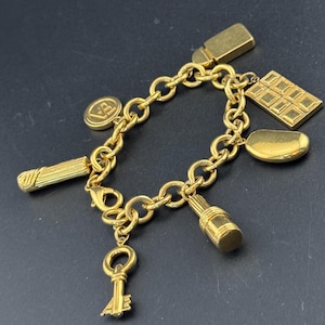 Signed Elizabeth Arden novelty cosmetics lipstick perfume scent charm bracelet gold plated