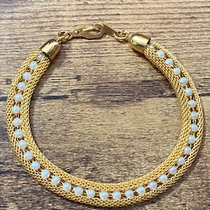 gold tone mesh cuff bracelet with faux pearl