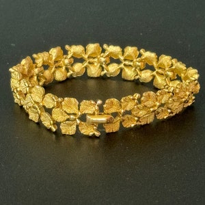 Signed TRIFARI Vintage retro gold plated textured modernist leaf articulated bracelet 1970s 1960s statement high end cuff bracelet