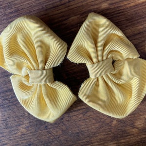 Vintage pair of primrose yellow GROSGRAIN ribbon BOW shoe clips
