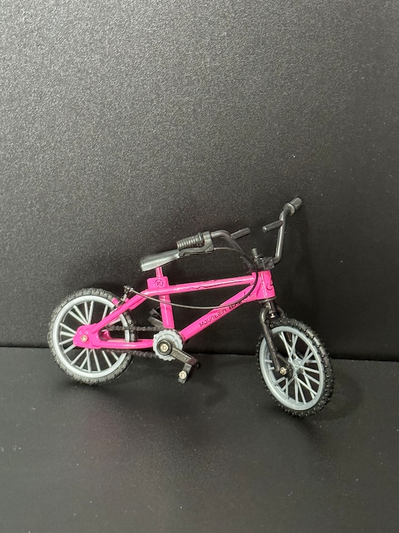 Bright pink bike hotsell