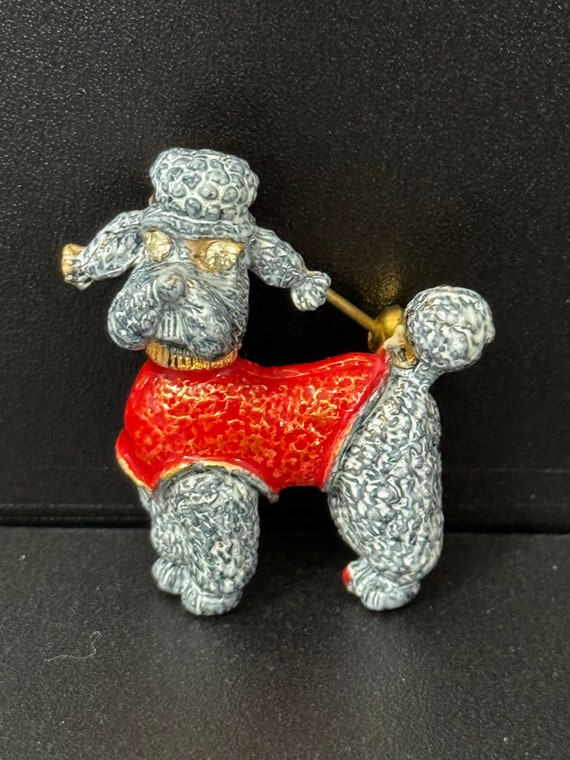 Broche animalière chien or jaune rubis
