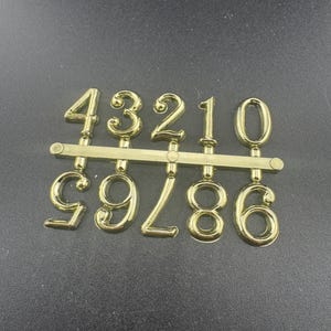 Gold Birthday Cake Number Toppers: Plastic Age Set
