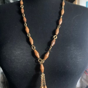 Vintage gold tone wooden beaded station link tassel drop necklace