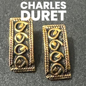 Signed Charles Duret French designer pair of vintage gold tone modernist textured pierced earrings from France