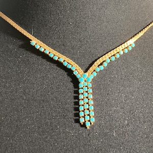 1970s gold tone mesh lariat drop necklace with turquoise glass paste
