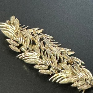 Signed Judy Lee vintage gold tone leaf bracelet panel link mid century