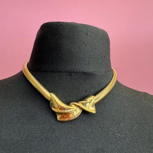 May include: A rustic wooden sign with the text "Welcome to our home" in white lettering. The sign features a distressed finish and a simple, inviting design, perfect for a front porch or entryway.