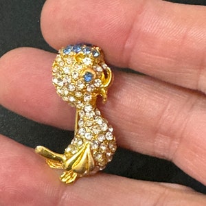 Novelty vintage duck brooch gold tone with clear diamanté and sapphire eyes