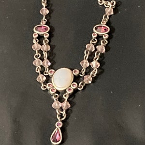 Signed AGATHA PARIS silver tone Latinate drop chain necklace with pink purple diamanté