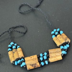 Retro turquoise blue and black wooden natural  beaded tie up bracelet unisex boho beach festival jewellery range