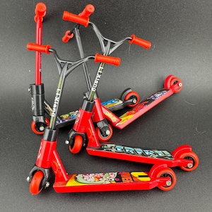 1 piece Miniature red and black scooter cake topper decoration plastic finger operated sports