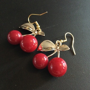 pair of bright red cherry drop earrings pierced rockabilly style