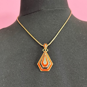 Signed sphinx Vintage modernist  1970s gold tone orange and brown geometric pendant necklace on a 68cm chain