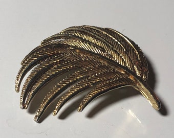 brushed metal textured swirl brooch mid century modernist design 1960s