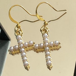 Handmade gold tone white seed Pearl cross drop earrings
