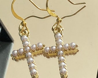 Handmade gold tone white seed Pearl cross drop earrings