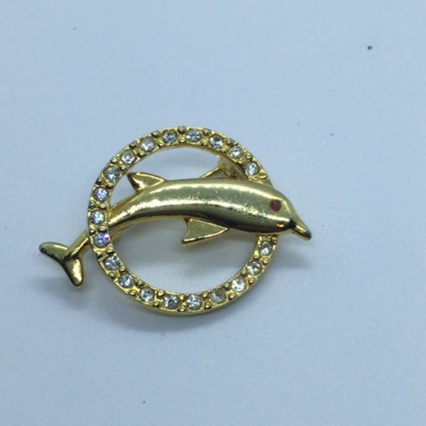 gold dolphin brooch with diamanté paste