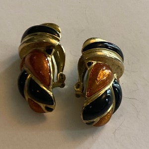 Vintage Gold tone black and brown enamel oversized clip on earrings