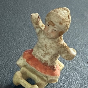 AF Antique Vintage PLASTER or bisque Snow Baby girl on sledge Christmas Xmas Cake topper decoration festive baking