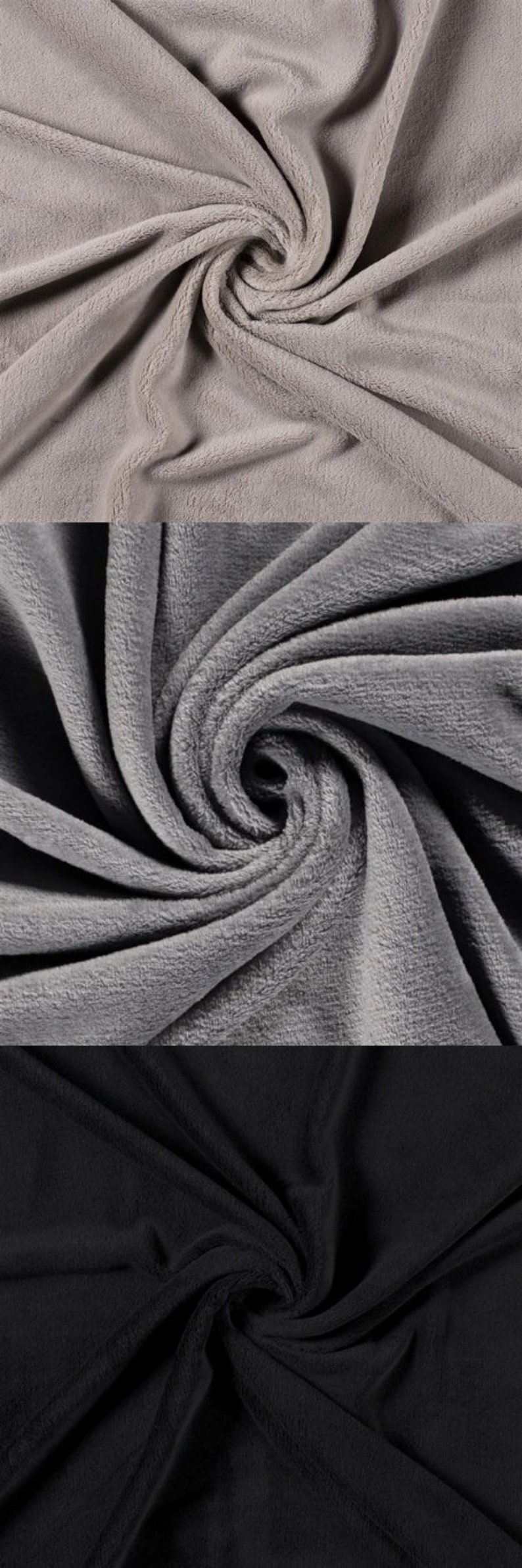 May include: A composite image showing three sections of soft, plush fleece fabric in solid colors. The top section is light beige, the middle section is medium gray, and the bottom section is black. Each fabric piece is arranged in a spiral.