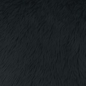 May include: Close-up of a black faux fur fabric. The fabric has long, soft, and wavy fibers, creating a textured surface. The color is a deep, solid black, with no visible patterns or variations in the material. The fur appears dense and plush.