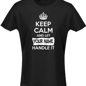 May include: Black t-shirt with a white crown, the text "Keep Calm and Let [Your Name] Handle It" and a torn paper effect around the name.