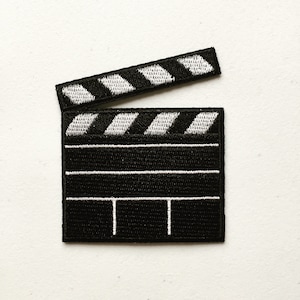 Remendo termocolante para claquete de cinema: presente para amantes de cinema